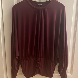 Gorgeous Draped Crew Neck Pleated Banded Bottom Top.